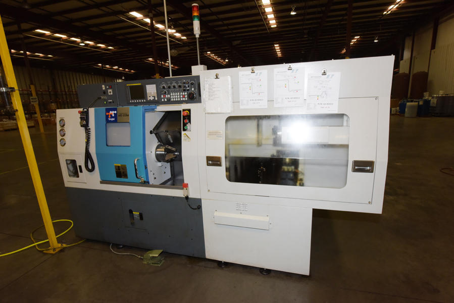 Picture of Tongtai Model HS-22M+Loading Topper 3 Axis CNC Turning Centers For_Sale DCM-4404