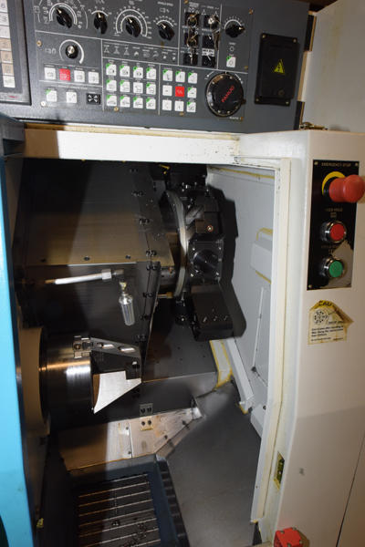 Picture of Tongtai Model HS-22M+Loading Topper 3 Axis CNC Turning Centers For_Sale DCM-4404
